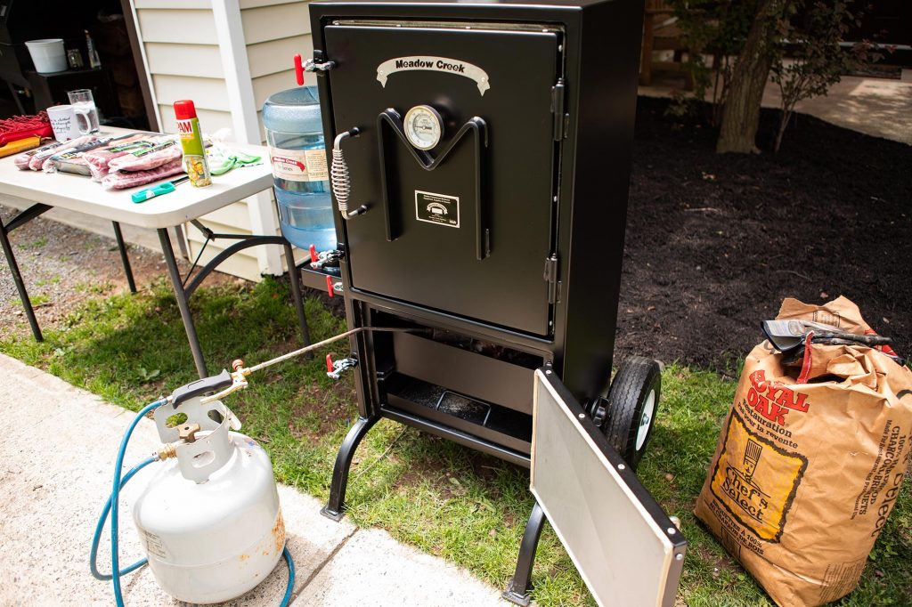Firing Meadow Creek BX25 Box Smoker  Breaking in the Meadow Creek BX25 Box Smoker