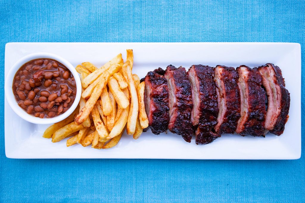 Smoked, Ribs, Fries and Beans Plated Breaking in the Meadow Creek BX25 Box Smoker