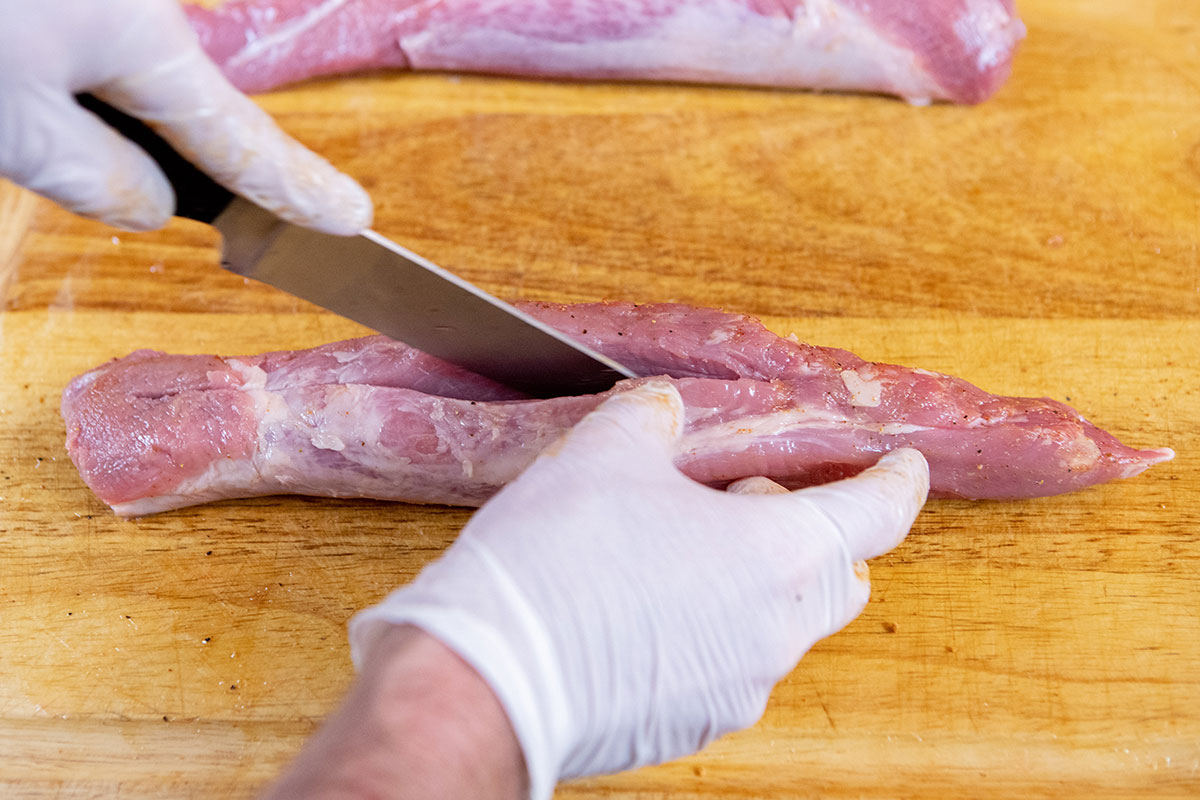 Slicing Pork Tenderloins to get a deeper pocket Bacon-Wrapped Apple-Stuffed Tenderloin on the Big Green Egg