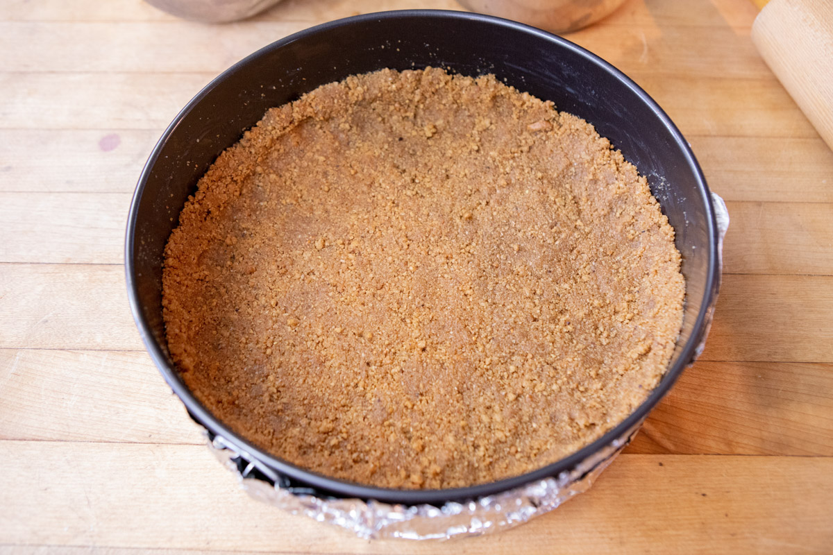 Prepping the Crust Pumpkin Cheesecake Recipe on the Big Green Egg