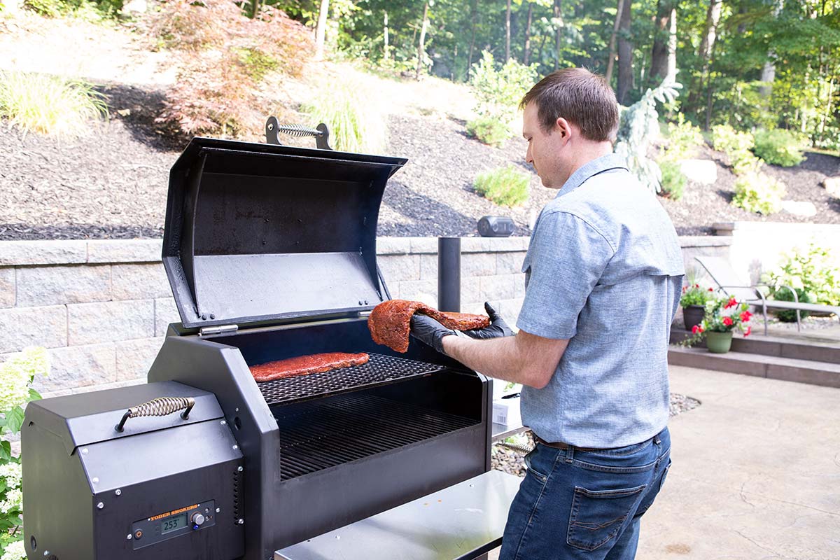 Putting Ribs on Yoder Pellet Smoker