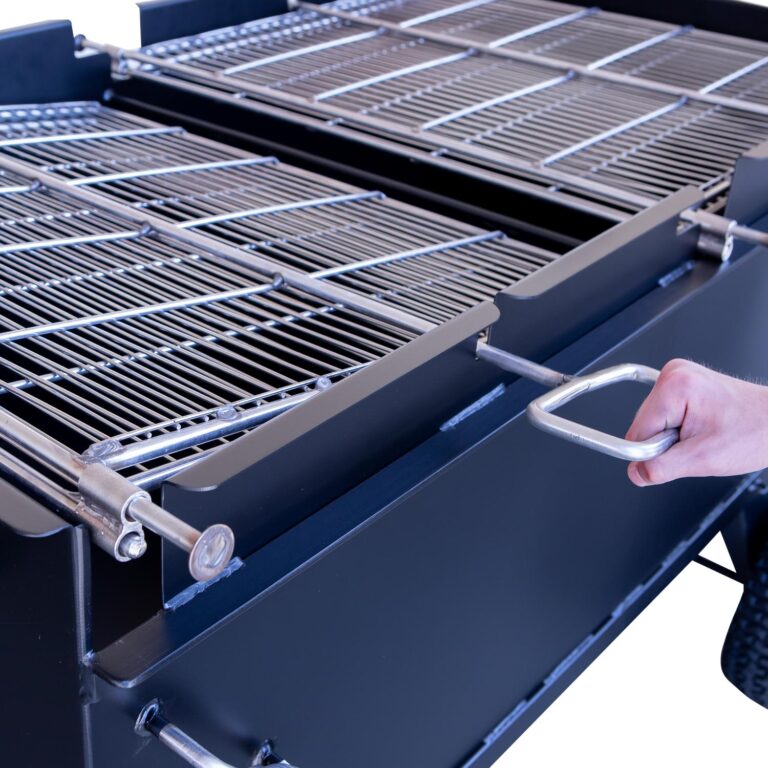Pivoting Double Sided Stainless Steel Grates on Meadow Creek BBQ64P Chicken Cooker