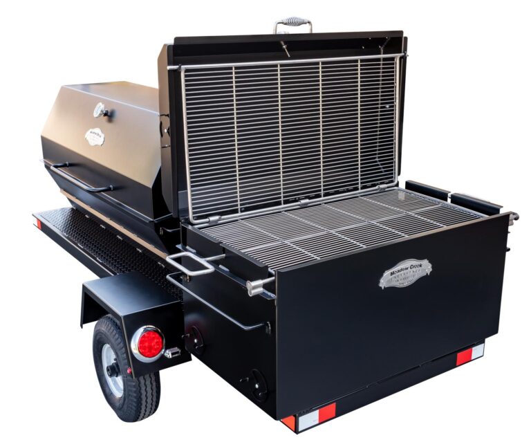 BBQ42 Double-Sided Grate Hooked Onto Lid on Caterer's Delight Trailer
