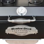 Stainless Steel Lid Handle and Thermometer on Meadow Creek SK23 Steak Grill With Optional Stainless Steel Ash Pan